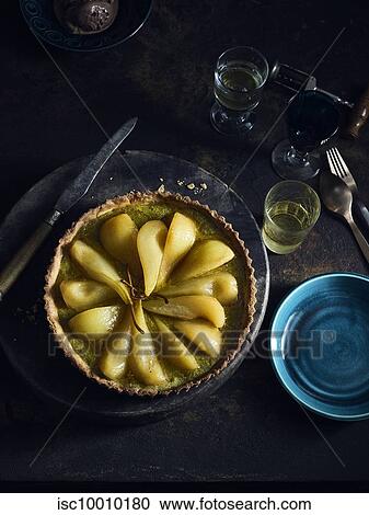 Pistachio frangipane poached pear tart View Large Photo Image Stock Image - Pistachio frangipane poached pear tart. Fotosearch