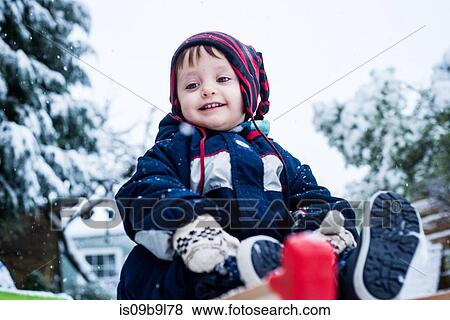 Portrait of boy wearing ski suit View Large Photo Image Stock Photo - Portrait of boy wearing ski suit. Fotosearch