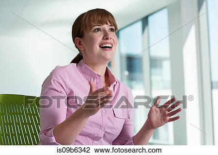 Portrait of businesswoman, gesticulating in conversation View Large Photo Image Stock Image - Portrait of businesswoman, gesticulating in conversation. Fotosearch