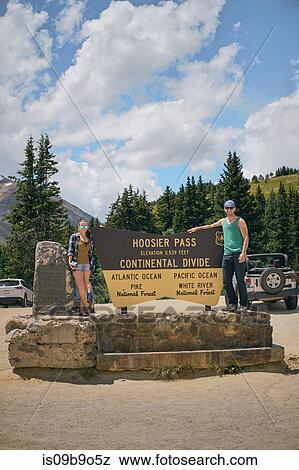 Portrait of couple by Continental Divide sign, Breckenridge, Colorado, USA View Large Photo Image Stock Photo - Portrait of couple by Continental Divide sign, Breckenridge, Colorado, USA. Fotosearch