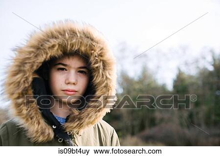 Stock Photo - Portrait of girl in countryside. Fotosearch