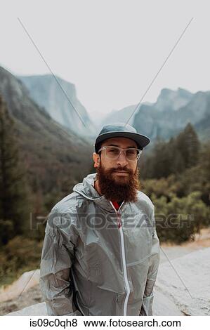 Portrait of hiker in nature reserve, Yosemite National Park, California, United States View Large Photo Image Stock Photo - Portrait of hiker in nature reserve, Yosemite National Park, California, United States. Fotosearch