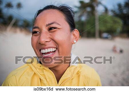 Portrait of laughing woman, Kailua Beach, Oahu, Hawaii View Large Photo Image Stock Image - Portrait of laughing woman, Kailua Beach, Oahu, Hawaii. Fotosearch