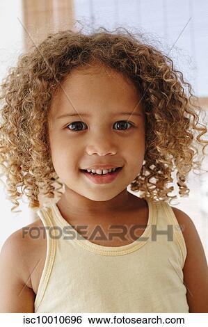 Portrait of little girl with afro hair View Large Photo Image Stock Photograph - Portrait of little girl with afro hair. Fotosearch