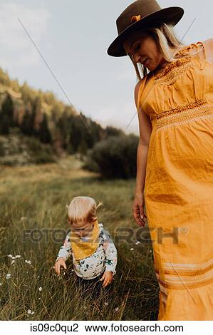 Pregnant mother with toddler daughter in rural valley, Mineral King, California, USA View Large Photo Image Stock Image - Pregnant mother with toddler daughter in rural valley, Mineral King, California, USA. Fotosearch