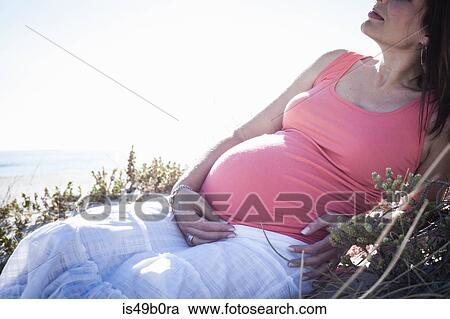 Stock Image - Pregnant woman, Cape Town, South Africa. Fotosearch