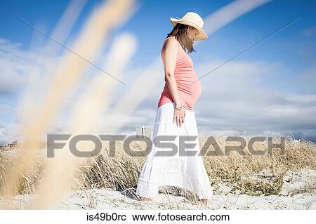 Pregnant woman on beach, Cape Town, South Africa View Large Photo Image Stock Image - Pregnant woman on beach, Cape Town, South Africa. Fotosearch