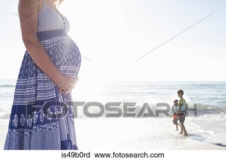 Pregnant woman on beach, Cape Town, South Africa View Large Photo Image Stock Image - Pregnant woman on beach, Cape Town, South Africa. Fotosearch