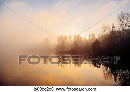 Stock Image - Puget Sound at sunset, Bainbridge, Washington, USA. Fotosearch