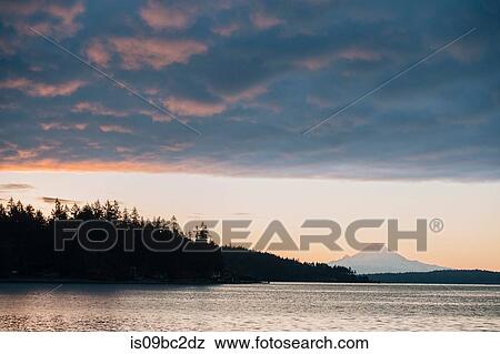Stock Photo - Puget Sound at sunset, Bainbridge, Washington, USA. Fotosearch