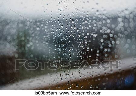 Raindrops on glass pane View Large Photo Image Picture - Raindrops on glass pane. Fotosearch
