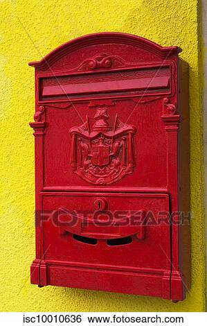 Stock Photograph - Red vintage mailbox on yellow stucco wall, Burano Island, Venetian Lagoon, Venice, Veneto, Italy. Fotosearch