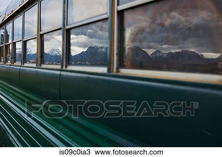 Reflection of mountain ranges on windows of mobile home bus, Homer, Alaska, United States View Large Photo Image Stock Image - Reflection of mountain ranges on windows of mobile home bus, Homer, Alaska, United States. Fotosearch