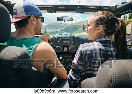 Road trip couple driving on rural road, Breckenridge, Colorado, USA View Large Photo Image Picture - Road trip couple driving on rural road, Breckenridge, Colorado, USA. Fotosearch