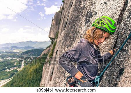 Rock climber climbing on The Chief, malamute, Squamish, Canada View Large Photo Image Stock Image - Rock climber climbing on The Chief, malamute, Squamish, Canada. Fotosearch