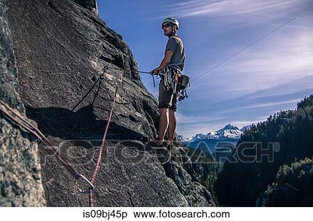 Rock climber climbing on The Chief, Malamute, Squamish, Canada View Large Photo Image Stock Photography - Rock climber climbing on The Chief, Malamute, Squamish, Canada. Fotosearch