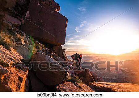 Rock climber, Desert Towers, Indian Creek, Moab, Utah, USA View Large Photo Image Picture - Rock climber, Desert Towers, Indian Creek, Moab, Utah, USA. Fotosearch