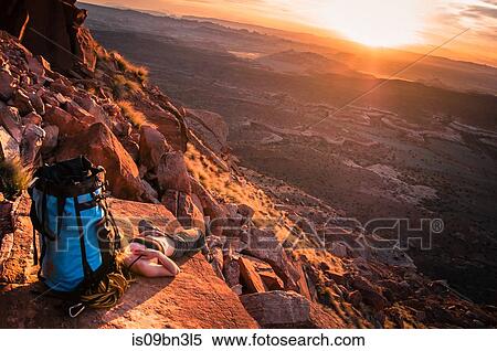 Stock Photography - Rock climber, Desert Towers, Indian Creek, Moab, Utah, USA. Fotosearch