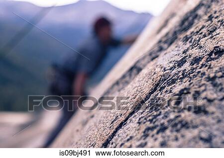 Rock climber rock climbing, Yosemite National Park, United States View Large Photo Image Stock Image - Rock climber rock climbing, Yosemite National Park, United States. Fotosearch