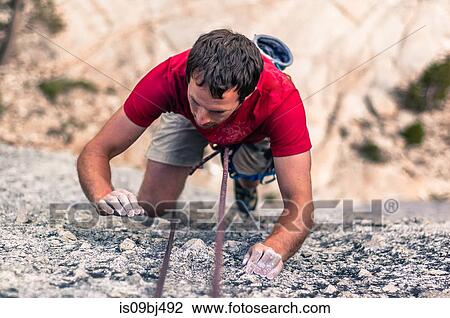 Rock climber rock climbing, Yosemite National Park, United States View Large Photo Image Stock Image - Rock climber rock climbing, Yosemite National Park, United States. Fotosearch