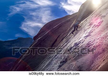 Rock climber rock climbing, Yosemite National Park, United States View Large Photo Image Stock Photo - Rock climber rock climbing, Yosemite National Park, United States. Fotosearch