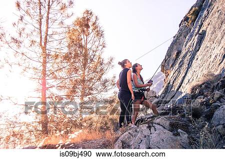 Rock climbers rock climbing, Yosemite National Park, United States View Large Photo Image Stock Image - Rock climbers rock climbing, Yosemite National Park, United States. Fotosearch