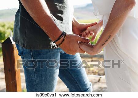 Romantic couple in vineyard, Cape Town, South Africa View Large Photo Image Stock Image - Romantic couple in vineyard, Cape Town, South Africa. Fotosearch