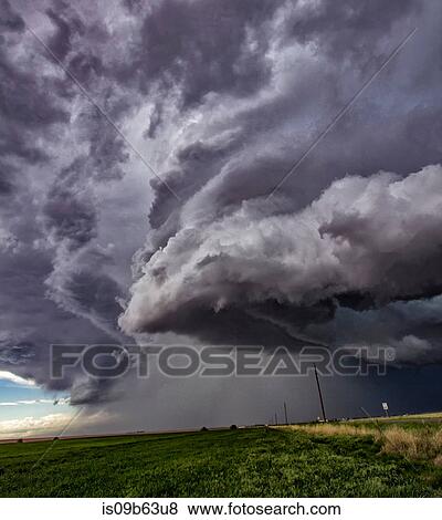 Rotating supercell clouds over rural area, Cope, Colorado, United States, North America View Large Photo Image Stock Photo - Rotating supercell clouds over rural area, Cope, Colorado, United States, North America. Fotosearch