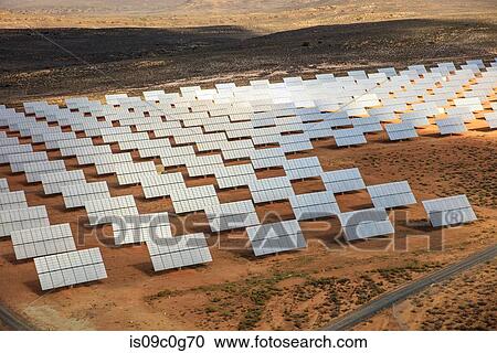 Rows of solar panels in arid landscape, aerial view, Cape Town, Western Cape, South Africa View Large Photo Image Stock Image - Rows of solar panels in arid landscape, aerial view, Cape Town, Western Cape, South Africa. Fotosearch