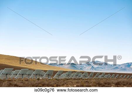 Rows of solar panels in landscape, rear view, Cape Town, Western Cape, South Africa View Large Photo Image Stock Photograph - Rows of solar panels in landscape, rear view, Cape Town, Western Cape, South Africa. Fotosearch