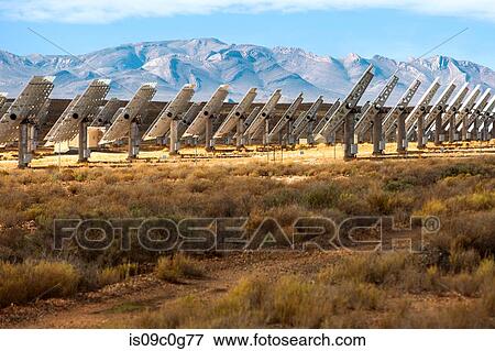 Stock Photo - Rows of solar panels in landscape, side view, Cape Town, Western Cape, South Africa. Fotosearch