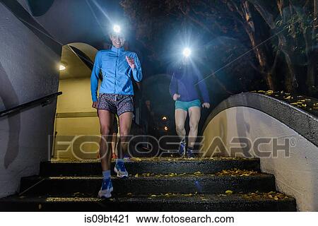 Runner with headlamp going down stairs, North Vancouver, Canada View Large Photo Image Stock Image - Runner with headlamp going down stairs, North Vancouver, Canada. Fotosearch