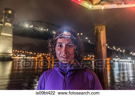 Runner with headlamp in urban North Vancouver, Canada View Large Photo Image Stock Image - Runner with headlamp in urban North Vancouver, Canada. Fotosearch