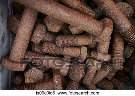 Rusty bolts on construction site, overhead close up View Large Photo Image Stock Photograph - Rusty bolts on construction site, overhead close up. Fotosearch