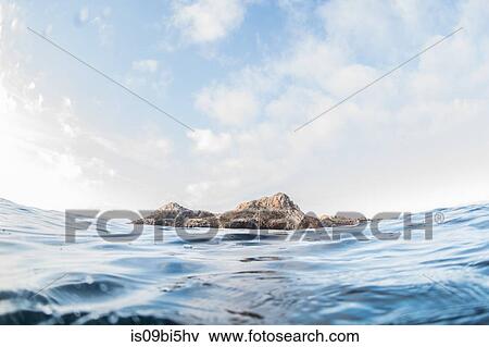 San Juanico island as seen from surface of ocean, Puerto Vallarta, Jalisco, Mexico View Large Photo Image Stock Photo - San Juanico island as seen from surface of ocean, Puerto Vallarta, Jalisco, Mexico. Fotosearch