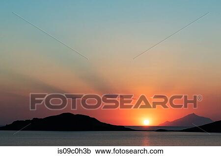 Scenic sunset over coastal mountains, Limnos, Khios, Greece View Large Photo Image Stock Image - Scenic sunset over coastal mountains, Limnos, Khios, Greece. Fotosearch