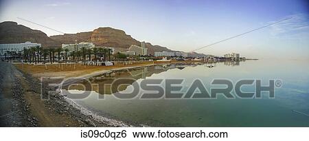 Stock Photograph - Scenic view of beach hotels on shores of the Dead Sea, panoramic view, Neve Zohar, Israel. Fotosearch