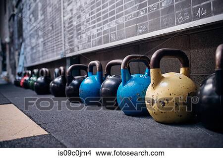 Scoreboards and kettlebells in gym View Large Photo Image Picture - Scoreboards and kettlebells in gym. Fotosearch