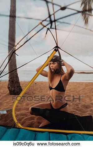 Scuba diver by tent on sandy beach, Princeville, Hawaii, US View Large Photo Image Stock Photograph - Scuba diver by tent on sandy beach, Princeville, Hawaii, US. Fotosearch