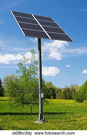 Solar energy collector panels mounted on metal post in field, Quebec, Canada View Large Photo Image Stock Photo - Solar energy collector panels mounted on metal post in field, Quebec, Canada. Fotosearch