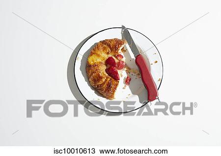 Strawberry danish pastry on plate with swiss army knife, overhead view View Large Photo Image Stock Image - Strawberry danish pastry on plate with swiss army knife, overhead view. Fotosearch