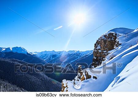Sunlit landscape of snow covered mountains, Aspen, Colorado, USA View Large Photo Image Stock Photo - Sunlit landscape of snow covered mountains, Aspen, Colorado, USA. Fotosearch