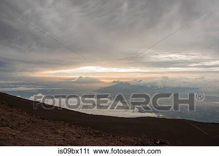 Sunset seen from mountain top, Haleakala, Maui, Hawaii View Large Photo Image Stock Photograph - Sunset seen from mountain top, Haleakala, Maui, Hawaii. Fotosearch