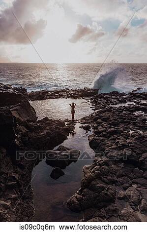 Swimmer enjoying enclosed sea pool, Princeville, Hawaii, US View Large Photo Image Picture - Swimmer enjoying enclosed sea pool, Princeville, Hawaii, US. Fotosearch