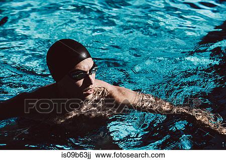 Swimmer in water in pool View Large Photo Image Stock Image - Swimmer in water in pool. Fotosearch