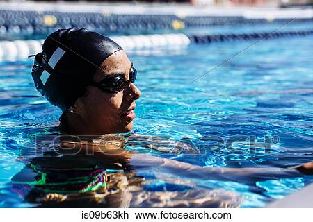 Swimmer in water in pool View Large Photo Image Stock Image - Swimmer in water in pool. Fotosearch