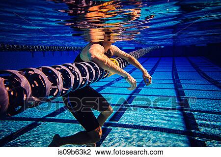 Swimmer resting on lane divider in pool View Large Photo Image Stock Image - Swimmer resting on lane divider in pool. Fotosearch