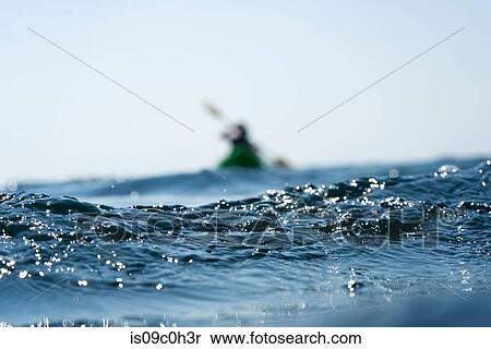 Teenage boy and mother sea kayaking, surface level shallow focus view, Limnos, Khios, Greece View Large Photo Image Stock Photography - Teenage boy and mother sea kayaking, surface level shallow focus view, Limnos, Khios, Greece. Fotosearch