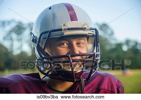 Teenage female football player on field View Large Photo Image Stock Image - Teenage female football player on field. Fotosearch