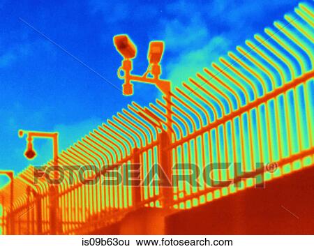 Thermal photograph of security cameras and fence View Large Photo Image Stock Photograph - Thermal photograph of security cameras and fence. Fotosearch